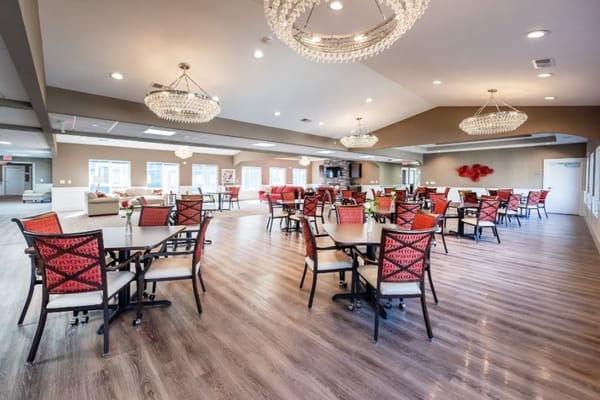 Bright dining area with tables and chairs