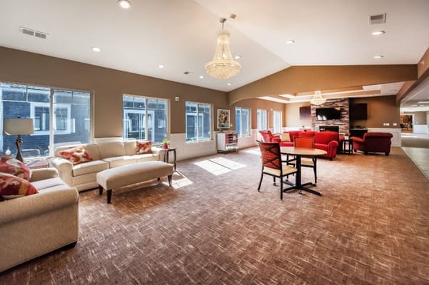 Bright common area with seating and natural light