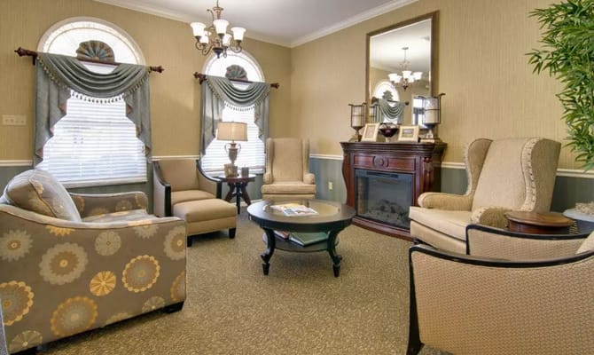 A cozy living room with comfortable seating and decorative accents.