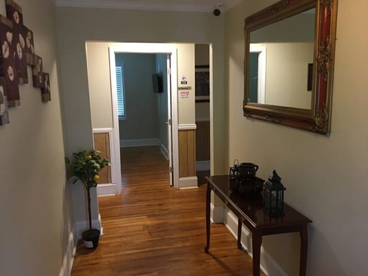 Hallway with wooden floor and decorative elements