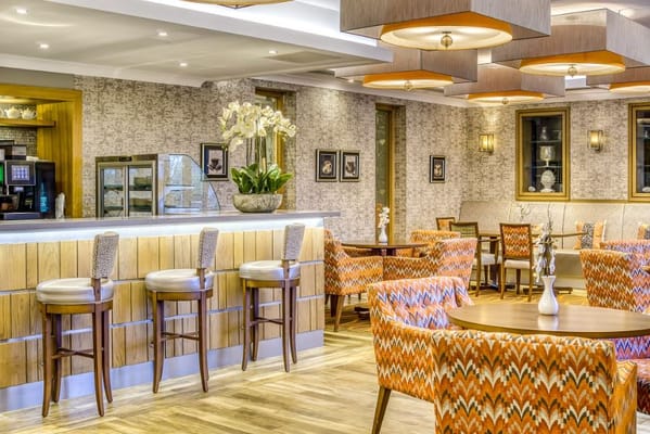 Bright dining room with modern decor and seating