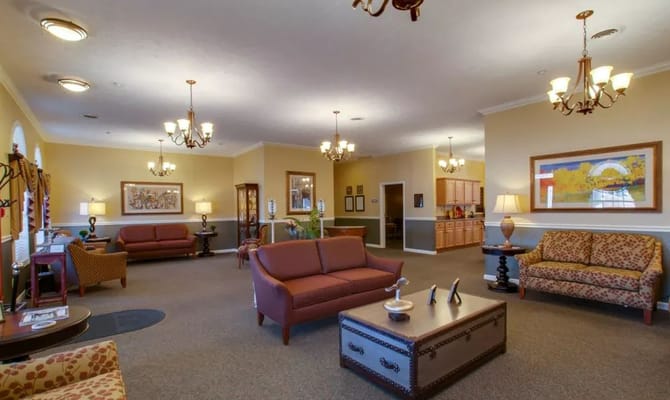 Well-furnished lobby area with seating and decor