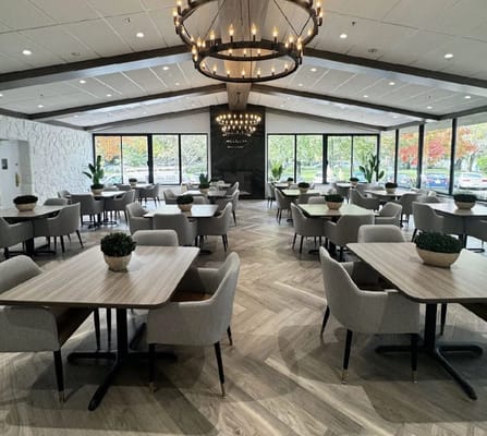 Bright and modern dining area with tables and chairs