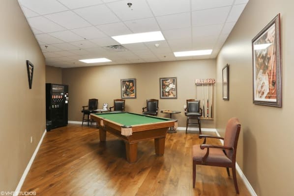 Interior view of a common area with a pool table