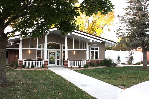 Front view of Rotary Senior Living facility surrounded by trees