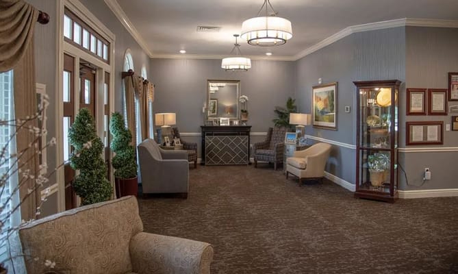 Cozy lobby area with seating and decorative elements.