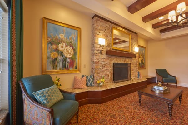 Elegant living room with a fireplace and artwork