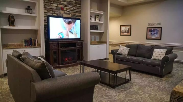 Comfortable living room with couches and a television