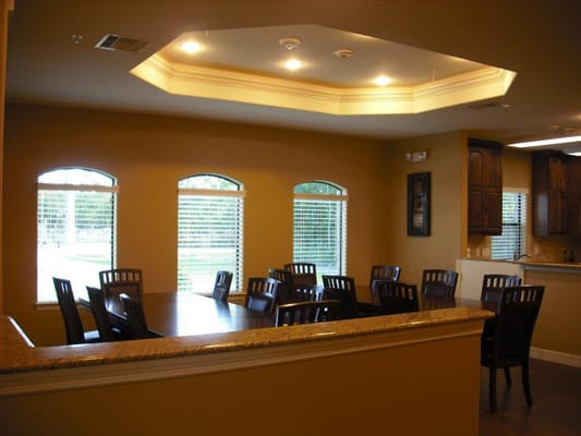 Interior view of a dining area with tables and lighting