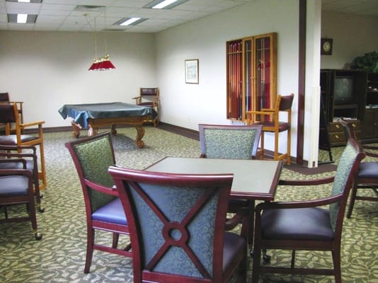 Interior common area with chairs and pool table