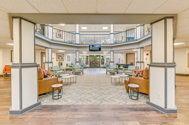 Spacious lobby area with comfortable seating and decor