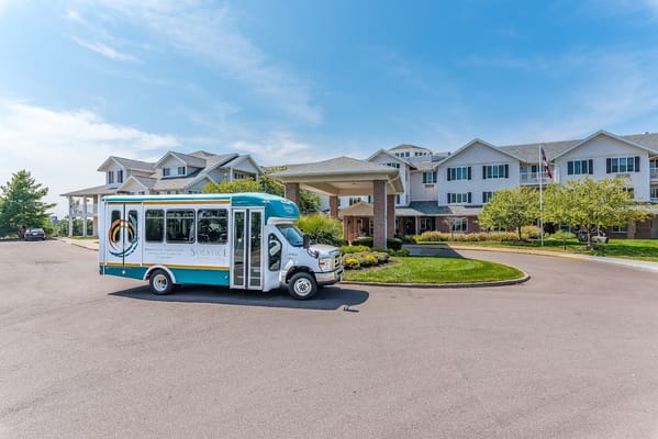Facility exterior view with transport vehicle