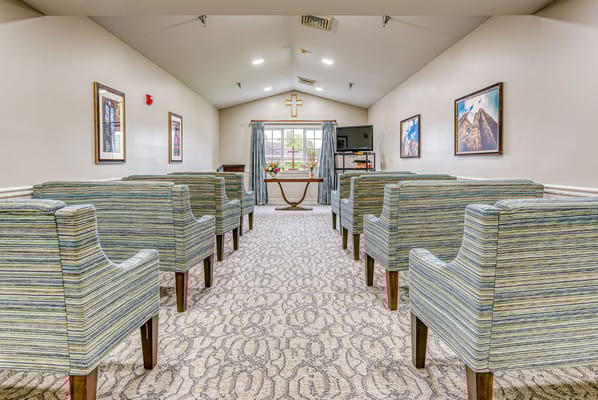 Interior of a common area with chairs and a window