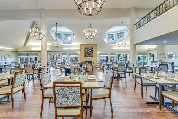 Dining room with tables set for meals