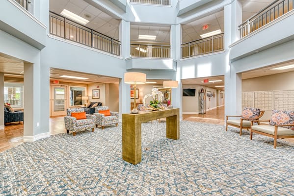 Bright and inviting lobby with seating and decorative elements