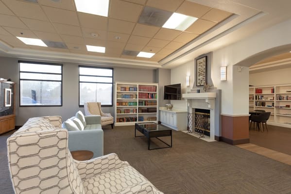 Interior of a cozy common area with bookshelves