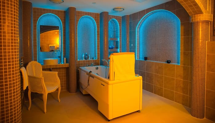 Contemporary bathroom with a soaking tub and stylish decor