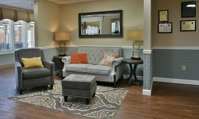 Living room with gray furniture and decorative items