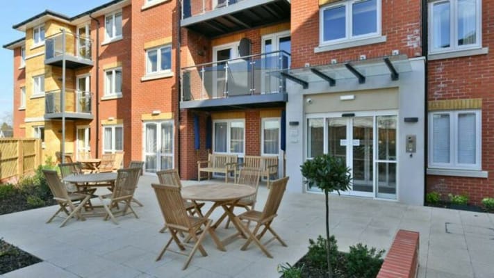 Outdoor seating area in front of the facility