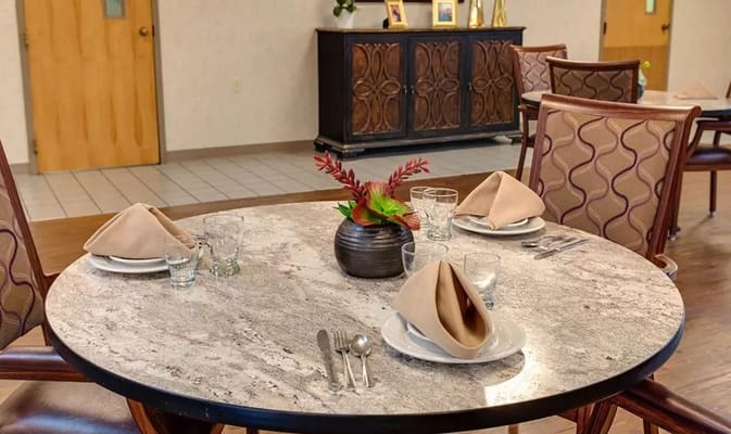 Dining table set for a meal at St. Clair Nursing Center