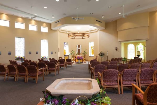 Interior view of a serene chapel with seating