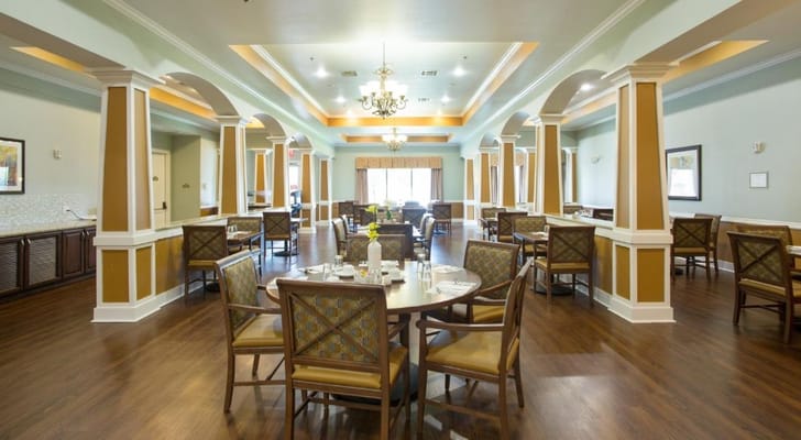 Elegant dining area with tables and chairs in Stonefield Assisted Living