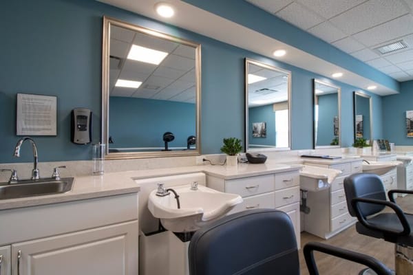 Interior view of the salon area with mirrors and styling stations