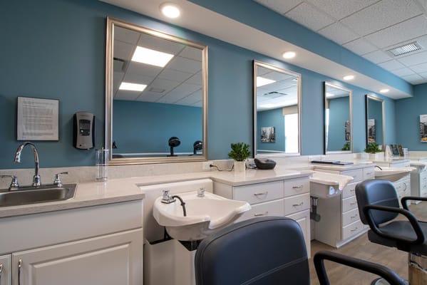 Interior view of the salon area with mirrors and styling stations