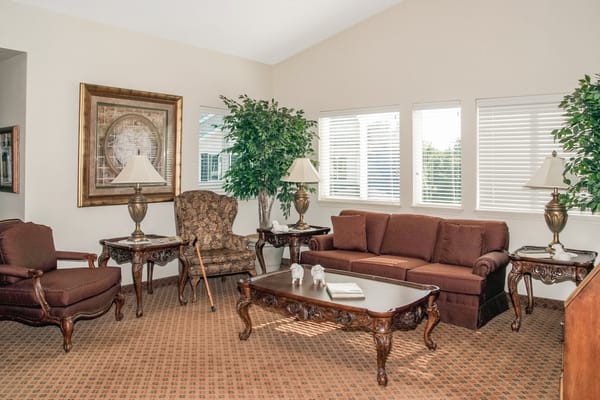 Lounge area with comfortable seating and natural lighting