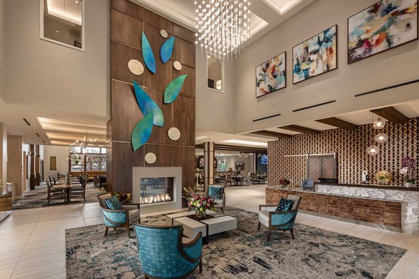 Modern lobby with seating and decorative wall art