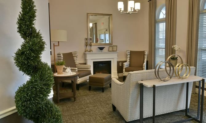 Cozy living room with comfortable seating and decorative plants