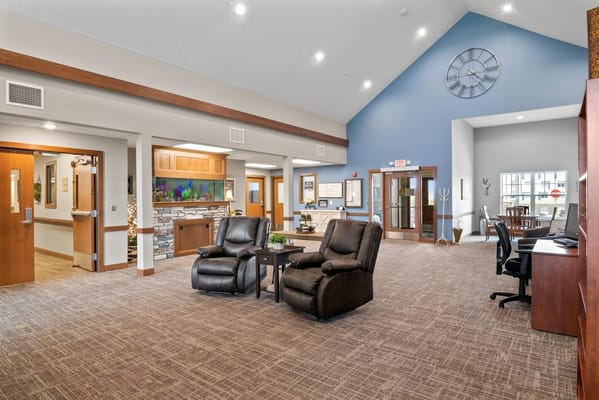 Comfortable chairs in the lobby of Suite Living of Eden Prairie