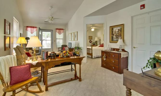 Living room with comfortable seating and decor at Teal Lake Senior Living