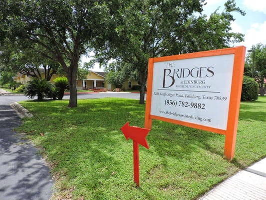 Sign for The Bridges at Edinburg assisted living facility