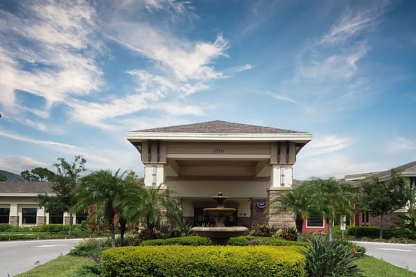 Exterior view of The Fountains of Hope with landscaping