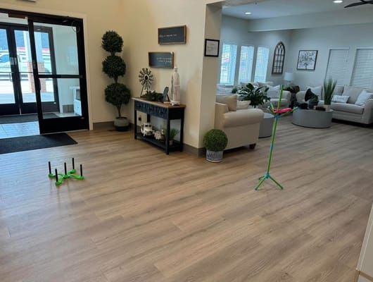 Lobby area with seating and activity equipment