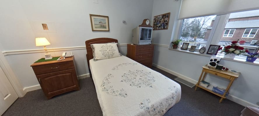 Cozy resident bedroom with personal touches and decor