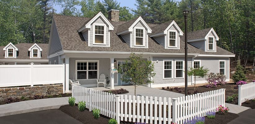 Exterior view of a nursing home with landscaped garden