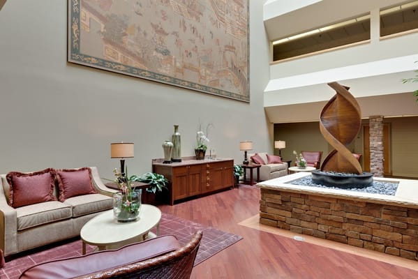 Interior lobby area with seating and decorative features