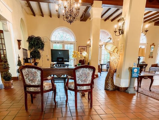 Cozy lobby area with elegant seating and decorative lighting