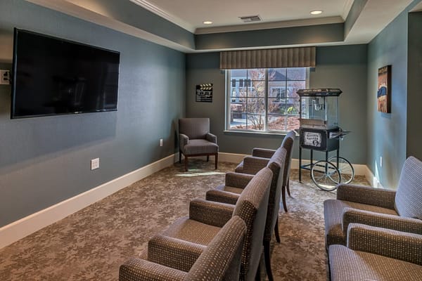 Interior common area with seating and TV