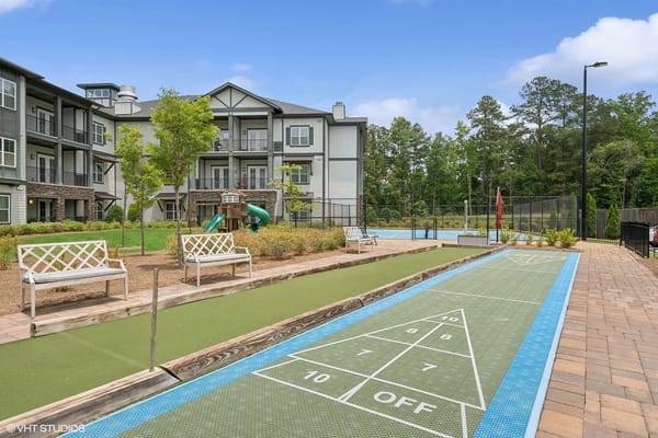 Outdoor shuffleboard court and seating area