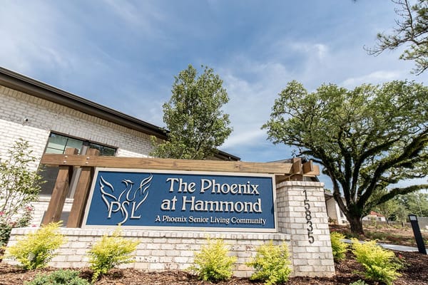 Sign for The Phoenix at Hammond senior living community