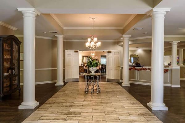 Elegant lobby with columns and seating area in The Retreat at Sandy Springs