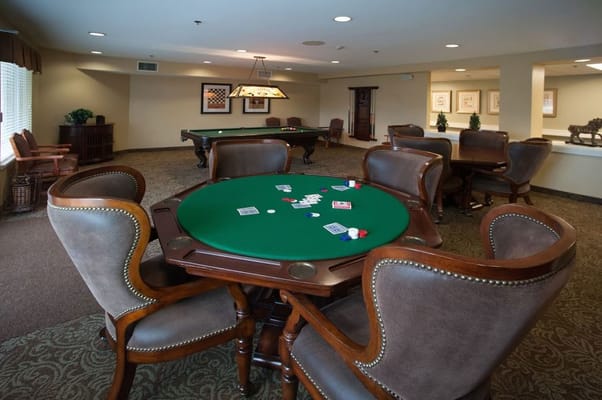 Interior view of a game room with poker tables