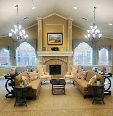 Elegant living room with comfortable seating and a fireplace