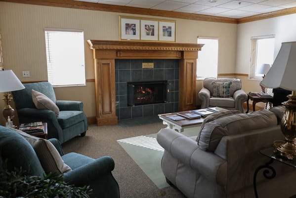 Comfortable living room with seating and a fireplace