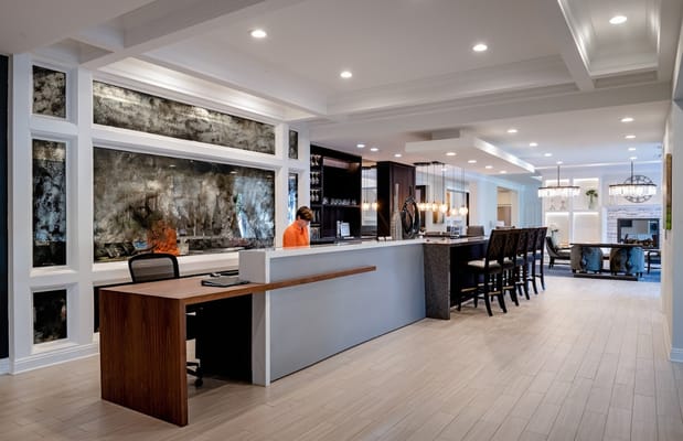 Bright and modern lobby area with a reception desk