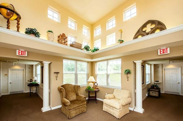 Cozy lobby area with natural light and seating options