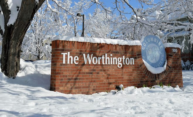 The sign of The Worthington Independent Living covered in snow